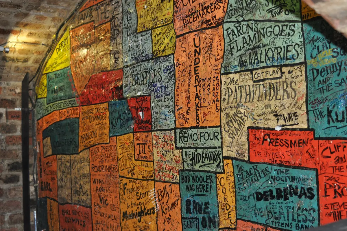 The brick wall of band names inside the Cavern Club