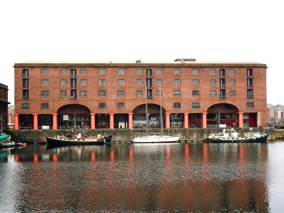 Red-brick warehouses and boats at the Royal Albert Dock